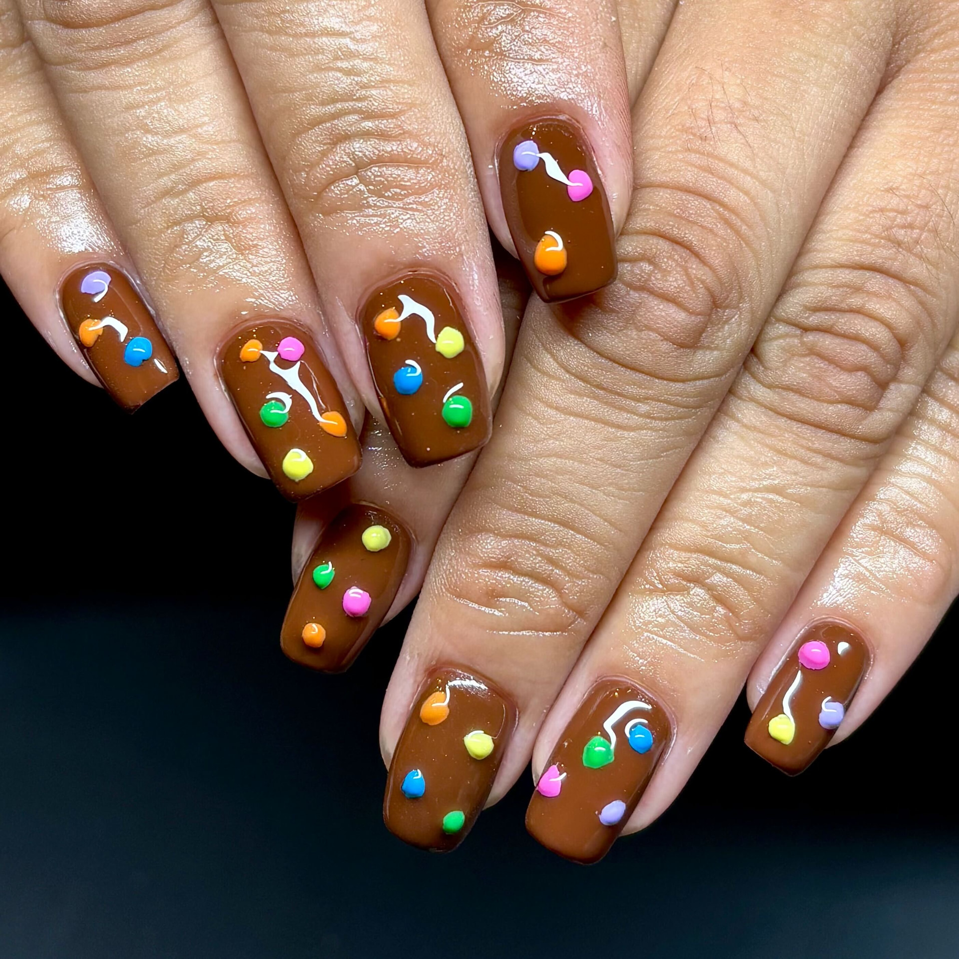 Chocolate brown square nails with hand-painted neon 3D gel dots in pink, orange, green and blue